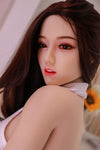 Nerina - Sexdoll brune sexy à lunettes