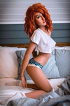 Arielle - Sex doll rousse jeune, fine et réaliste