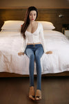 Eunha - Sex doll asiatique en jean slim et top blanc